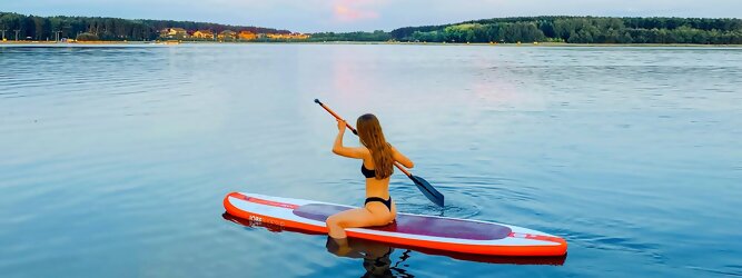 Trip Austria - Wassersport mit Balance & Technik vereinen | Stand up paddeln, SUPen, Surfen, Skiten, Wakeboarden, Wasserski auf kristallklaren Bergseen